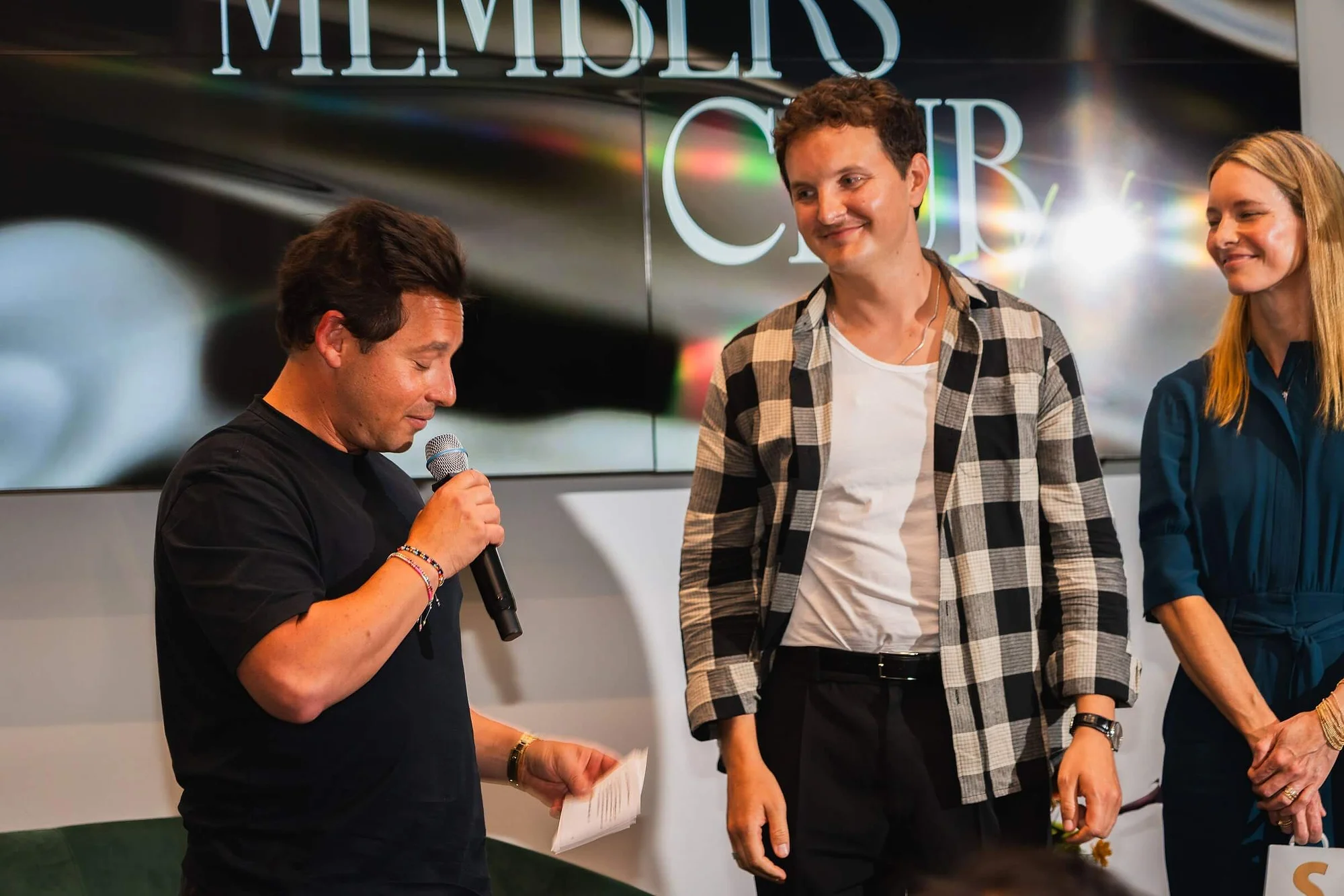 Shopify President Harley Finkelstein presenting the award to Element Brooklyn's Andrew Nicol. 